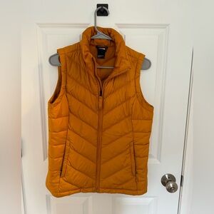 The North Face gold/mustard yellow down vest